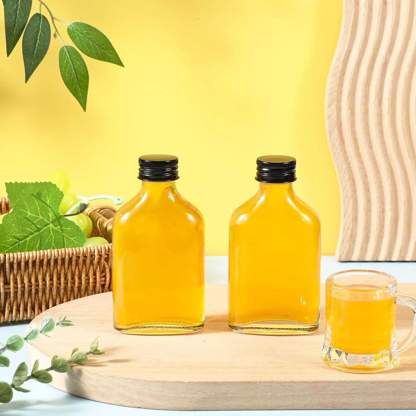 Gejoy 24 Pcs Mini Liquor Bottles Reusable Glass Flask Bottles with Black Caps Clear Empty Alcohol Shot Jars Small Champagne Jars with 4 Funnels for Wine Weddings Party Favors Christmas(3.4 oz)